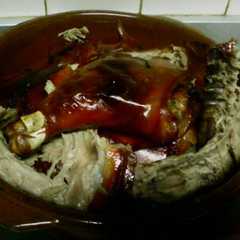 Una foto de Cochinillo asado