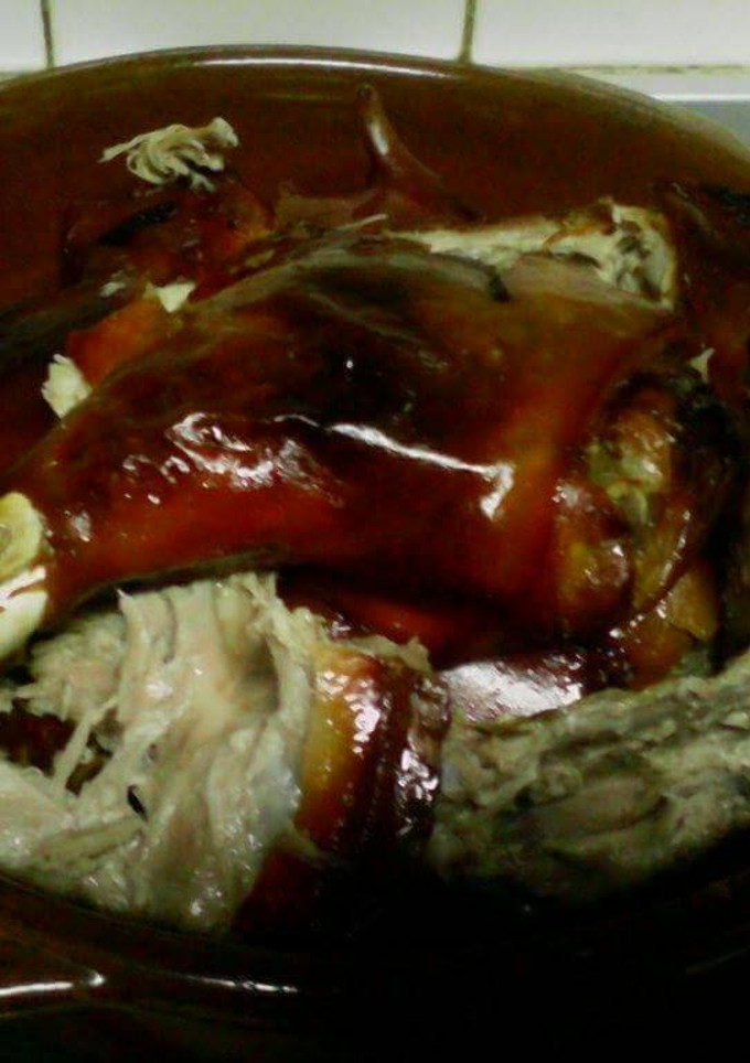 Una foto de Cochinillo asado
