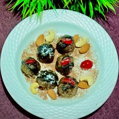 A picture of New Year Party Special Mixed Seeds, Chocolate, Fruits and Nuts Truffles.