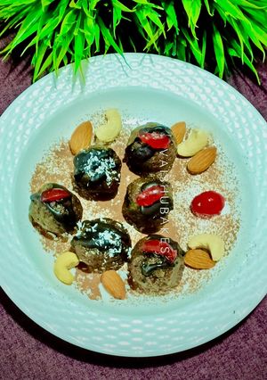 A picture of New Year Party Special Mixed Seeds, Chocolate, Fruits and Nuts Truffles.