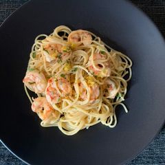 A picture of Pasta with shrimp, tarragon and lemon.