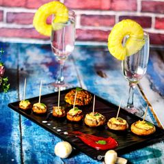 A picture of Chessy Stuffed Mushrooms.