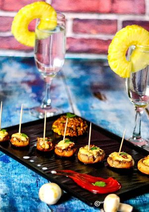 A picture of Chessy Stuffed Mushrooms.