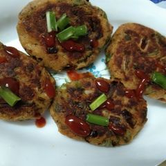 A picture of Spring Onion and Potato Cutlets.