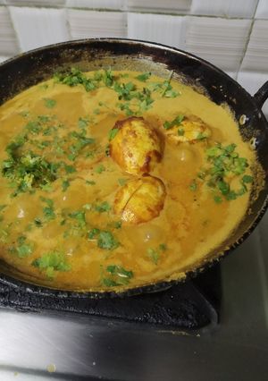 A picture of Appam with Egg kurma.