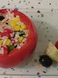 Tomate rosa relleno de ensalada de arroz