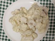 Una foto de gnocchi con nata