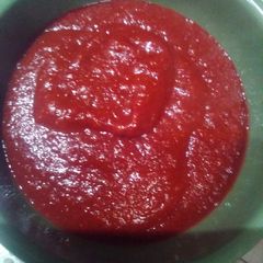A picture of Red chile pepper sauce.