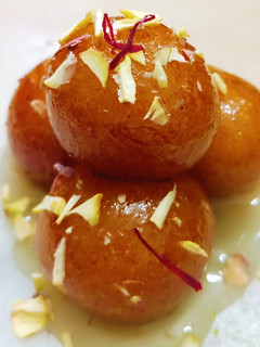 A picture of Vanilla Gulab Jamun.