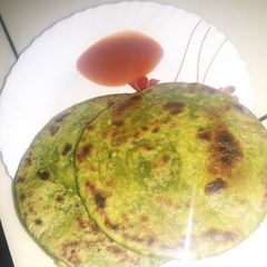 Moong dal with palok paratha A picture of Moong dal with palok paratha.
