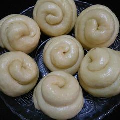 A picture of Chinese steamed buns with manchow soup for breakfast.