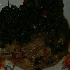 A picture of Stewed beef and kales.