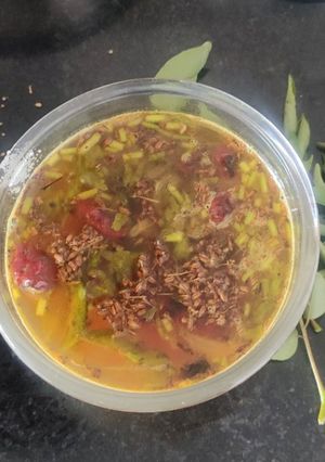 A picture of Neem flower rasam.