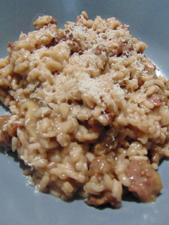 Foto di Risotto salsiccia e funghi sfumato al vino rosso