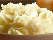 A picture of mashed potatoes with heavy cream