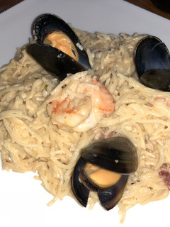 Una foto de Pasta con Camarón y mejillón al Chipotle Sonorense