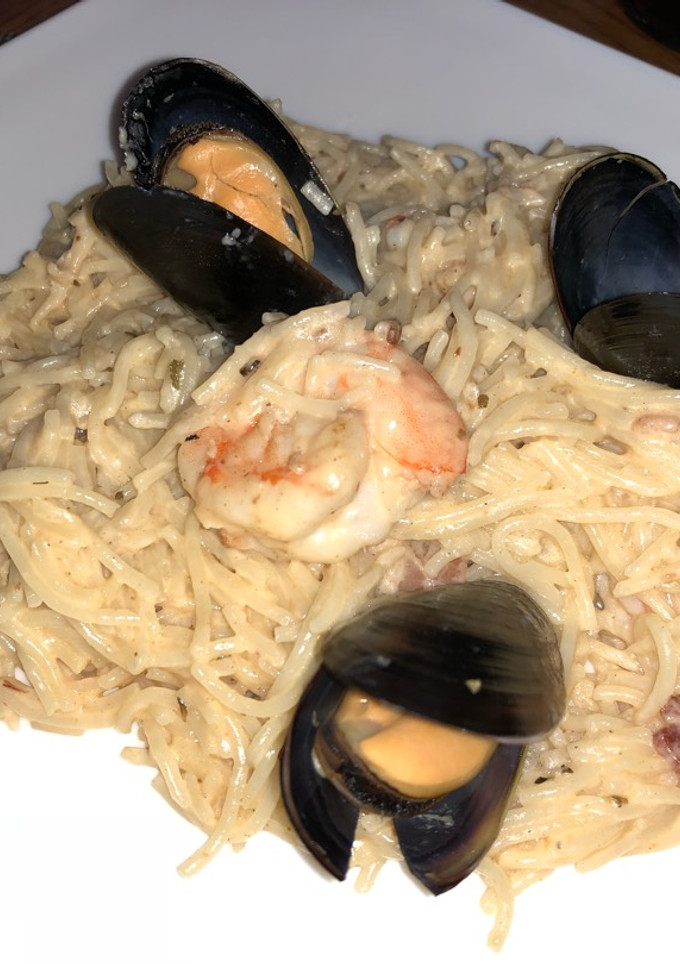 Una foto de Pasta con Camarón y mejillón al Chipotle Sonorense