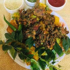 A picture of Onions and Curry Leaves Pakoras.