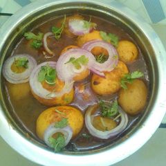 A picture of Potato egg curry.