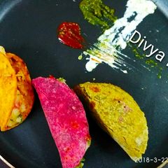 A picture of Tri colour paratha bites.