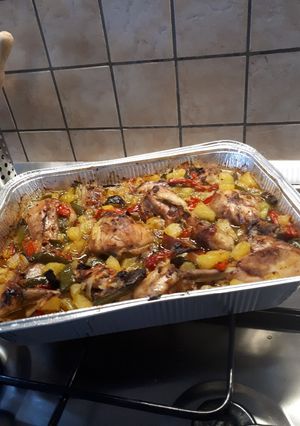 A picture of Oven-Baked Chicken with Bell Peppers and Sweet Potatoes.