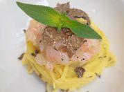 Una foto di tagliolini al tartufo