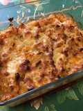 Gratin de pommes de terre, navets et panais à la tomate et lard