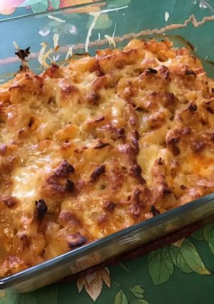 Une photo de Gratin de pommes de terre, navets et panais à la tomate et lard