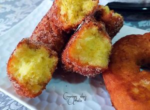 Foto principal de Rosquillas de naranja esponjosas con aromas a azahar