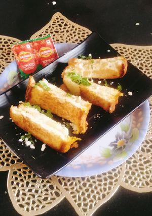 A picture of Cheese Spread Garlic Toast 🤤 😋.