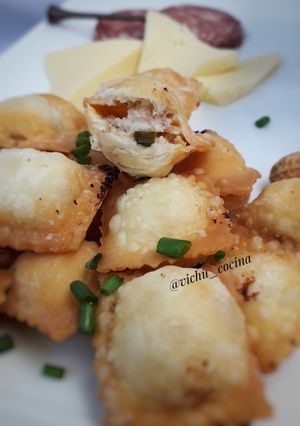 Una foto de Ravioles fritos