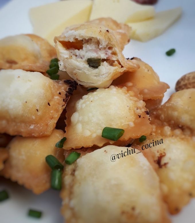 Una foto de Ravioles fritos