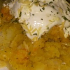A picture of Cookies Smothered Potatoes & Toppings.