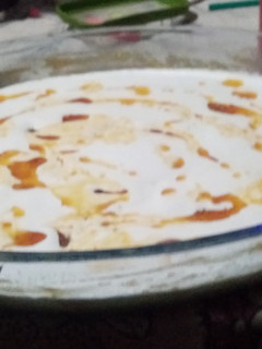 Una foto de Crema Casera de Naranja, caramelo y merengue