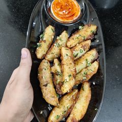 A picture of Garlic Potato Wedges.