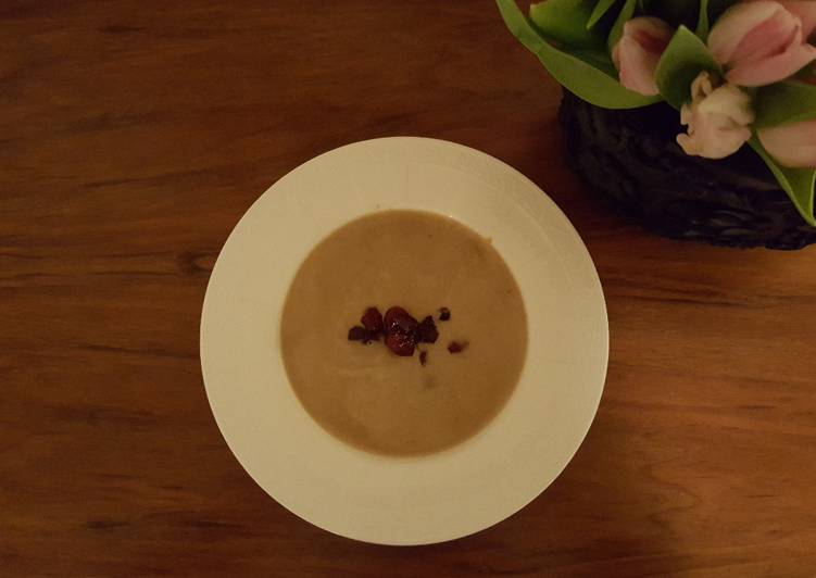 Chestnut soup with cranberry topping