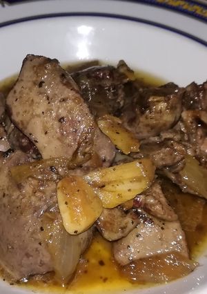 Una foto de Higadillos de pollo encebollado