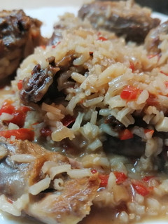 Una foto de Arroz meloso con conejo