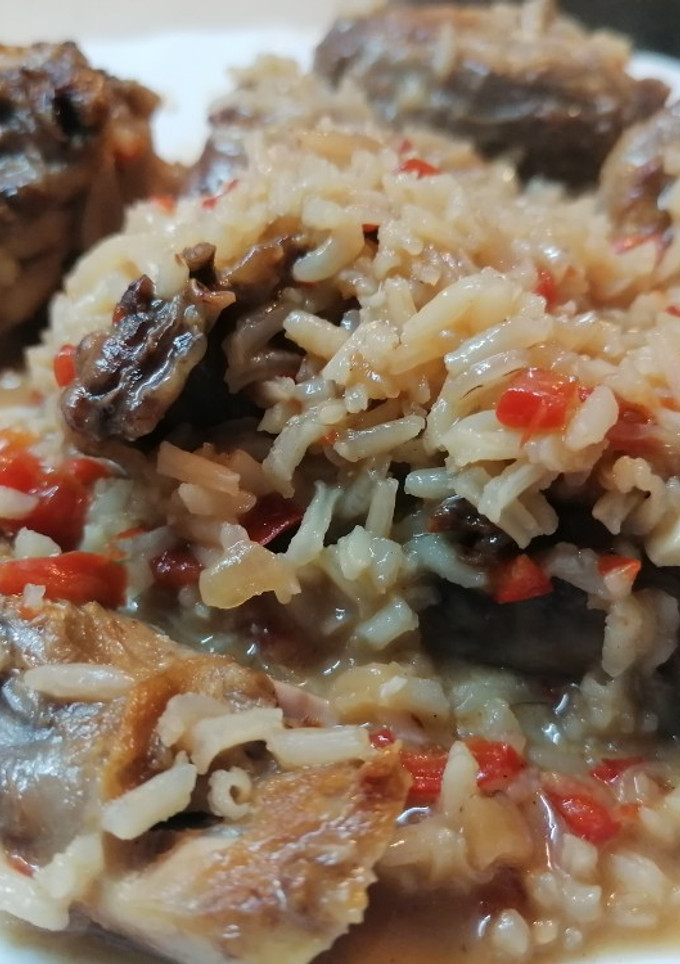 Una foto de Arroz meloso con conejo