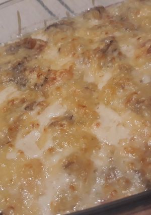 Una foto de Gratinado de patatas, setas y bacon