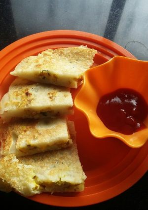 A picture of Suji uttapam Anda(bhurji) sandwich.
