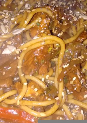 Una foto de Wok de carnes al vodka cítrico