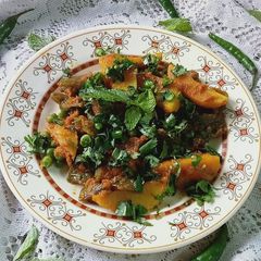 A picture of Sim motor ar aloor torkari(flat bean seeds,peas and potato sabji.