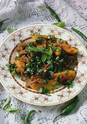 A picture of Sim motor ar aloor torkari(flat bean seeds,peas and potato sabji.