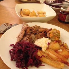 A picture of Roast Duck with Braised Red Cabbage and Bread Sauce.