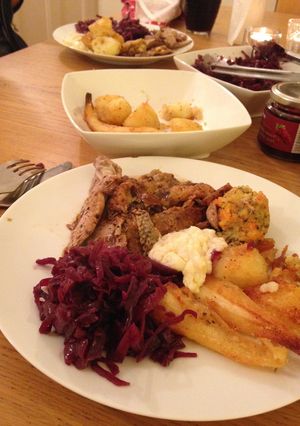 A picture of Roast Duck with Braised Red Cabbage and Bread Sauce.