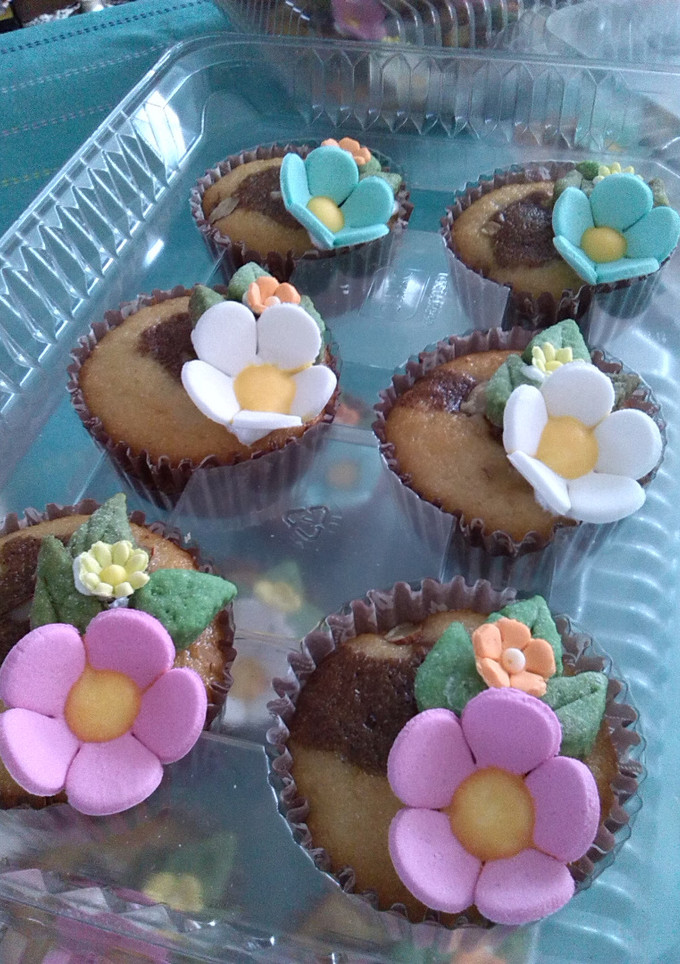 Una foto de Ponquesitos marmoleados de chocolate y almendras