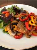 Grilled Salmon with Sautéed Mushrooms mixed Bell Peppers, and Greens Salad used BBQ Sauce