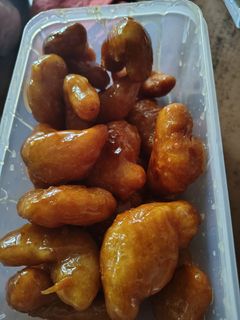 Una foto de Pestiños tradicionales con miel
