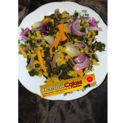 A picture of Dambun couscous with moring leaves and carrot.